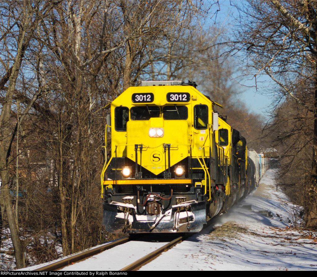 Eastbound SU 100 at Rock Road MP 24 on its way to Ridgefield Park in the wiater sun 